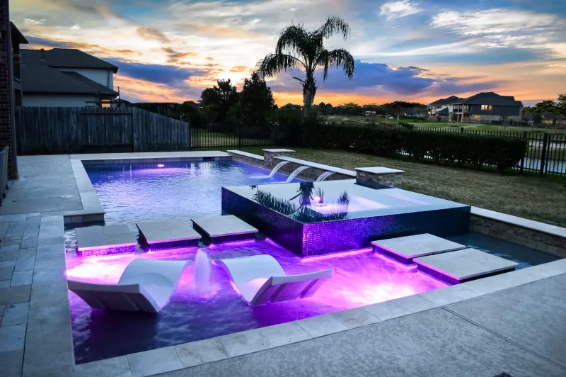 Pavers, Patios, and Proper Drainage: The Hardscaping Game Plan Every Woodlands Pool Owner Needs